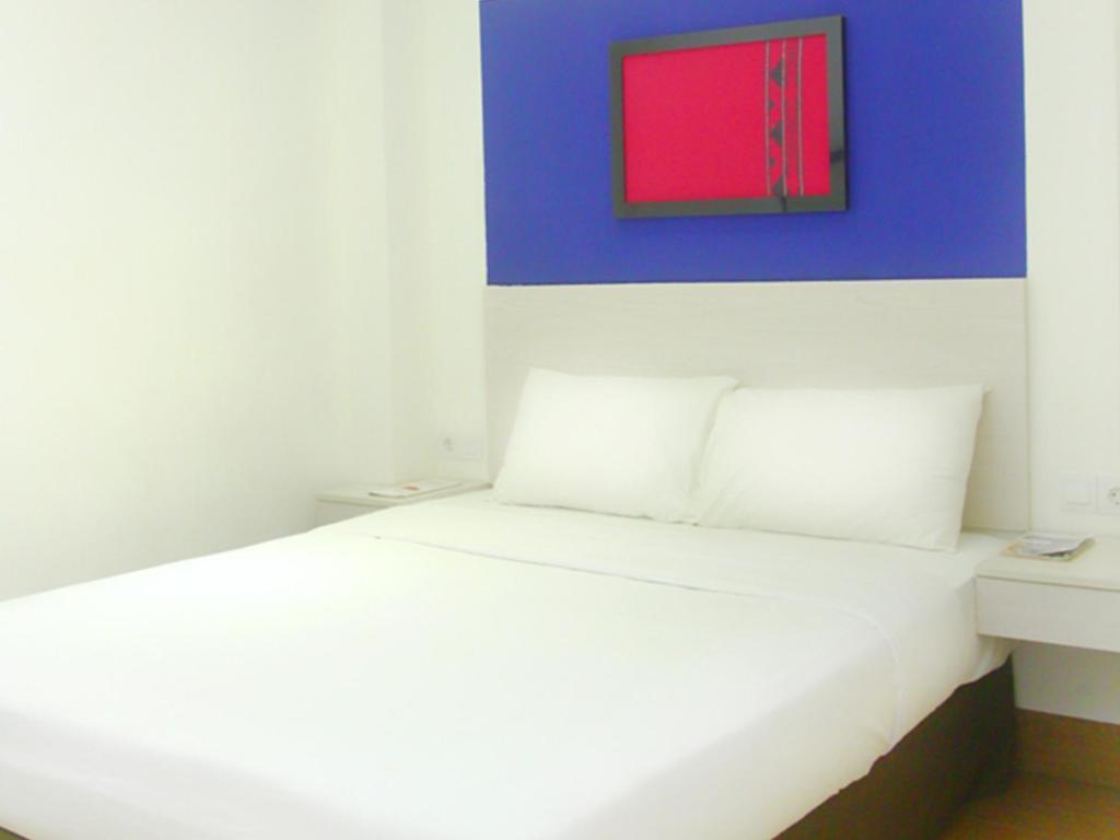 Dragon Inn Kendari Quarto foto