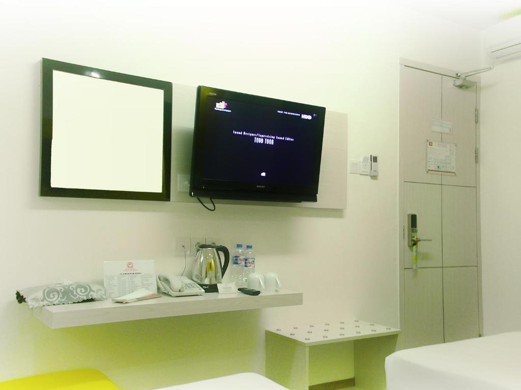 Dragon Inn Kendari Quarto foto